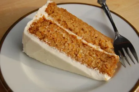A plate showing a slice of carrot cake. Great for IBS symptoms
